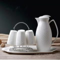 red ceramic teapot